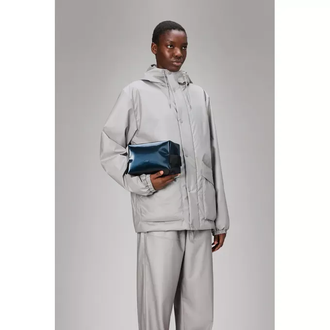 rains_neceser_wash_bag_small_15580_spill_4