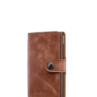 Tarjetero metálico Secrid _tarjetero_miniwallet_vintage_cognac_brown con diseño compacto